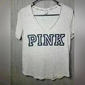 PINK by Victoria Secret. V Neck heather gray shirt with PINK logo on front.